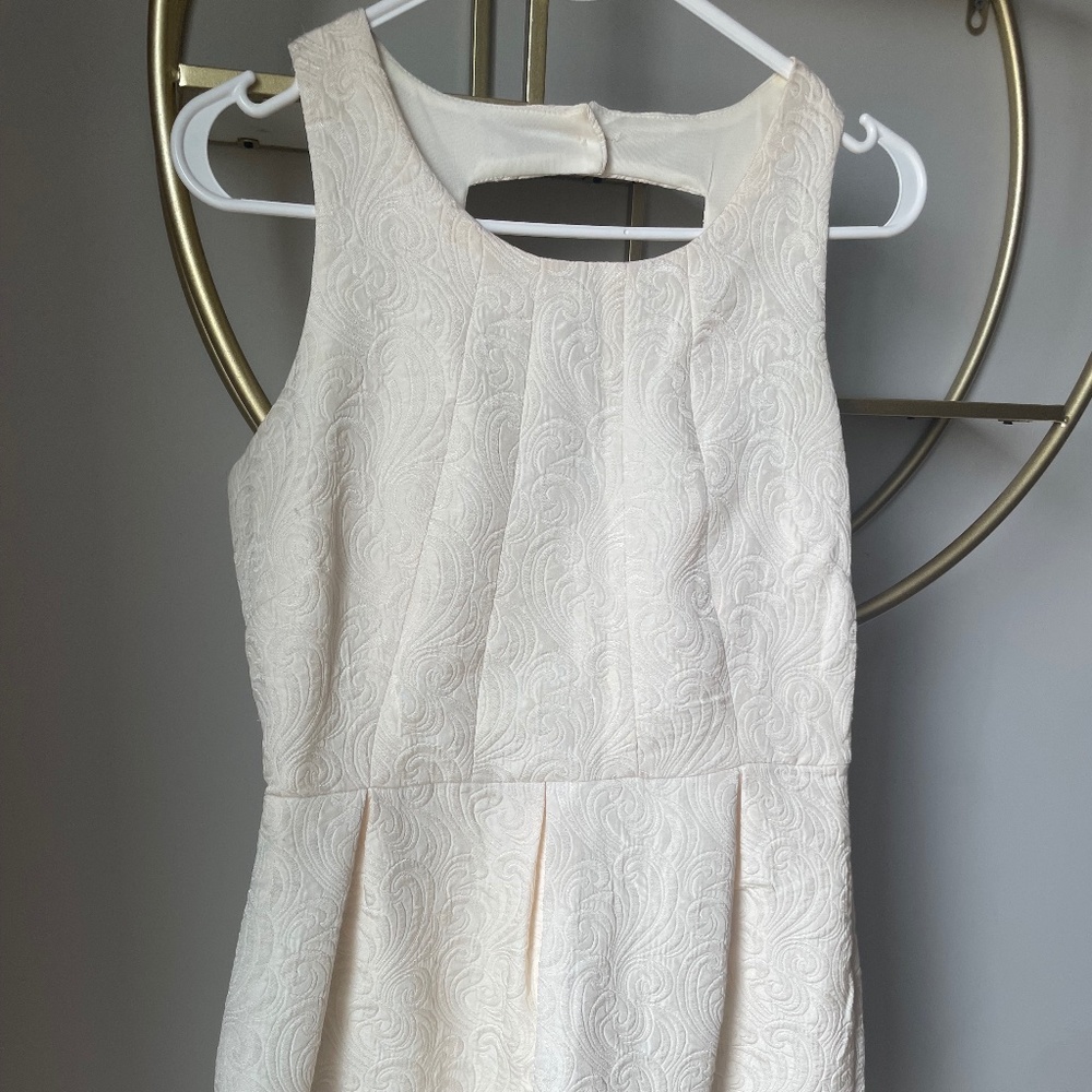 Cream printed dress with open back